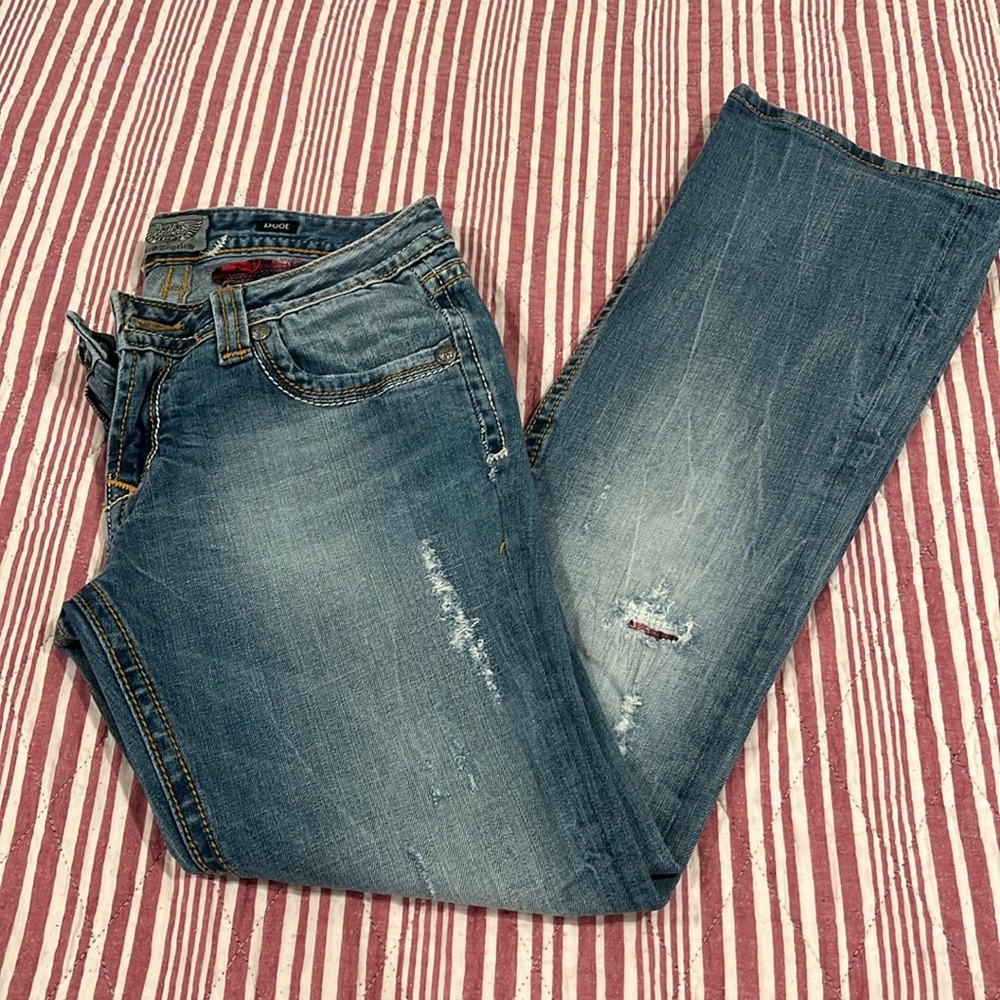 Re Rock for express  Size 4R  distress with sewn patches in good condition